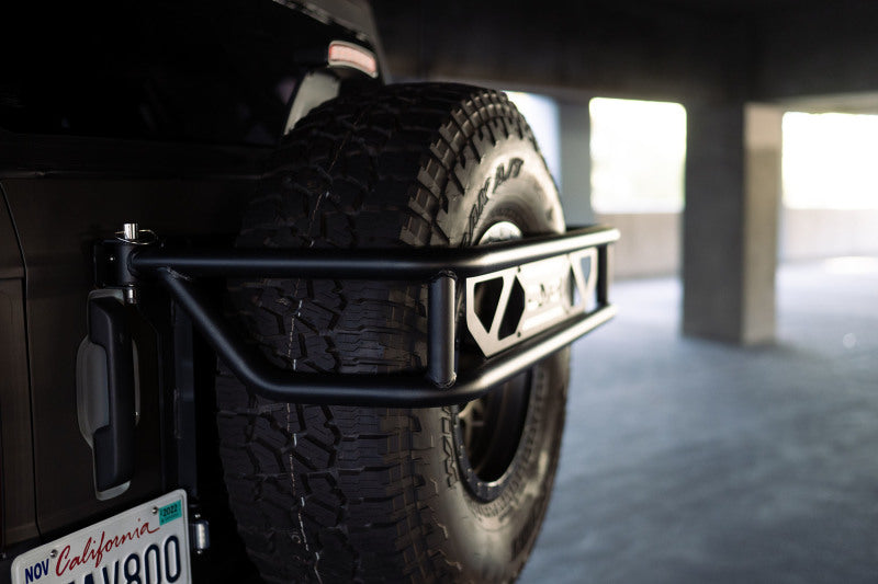 DV8 Offroad 21-23 Ford Bronco Spare Tire Guard & Accessory Mount - Racecraft Industries