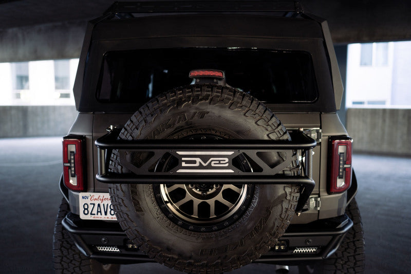 DV8 Offroad 21-23 Ford Bronco Spare Tire Guard & Accessory Mount - Racecraft Industries