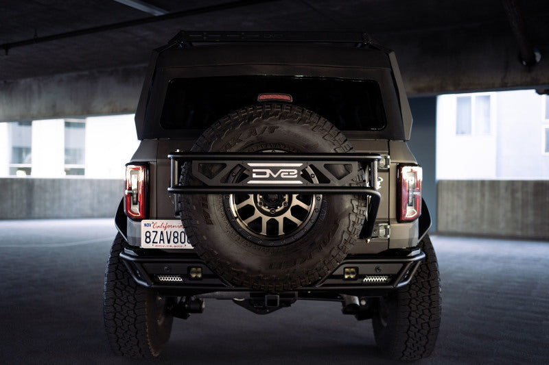 DV8 Offroad 21-23 Ford Bronco Spare Tire Guard & Accessory Mount - Racecraft Industries