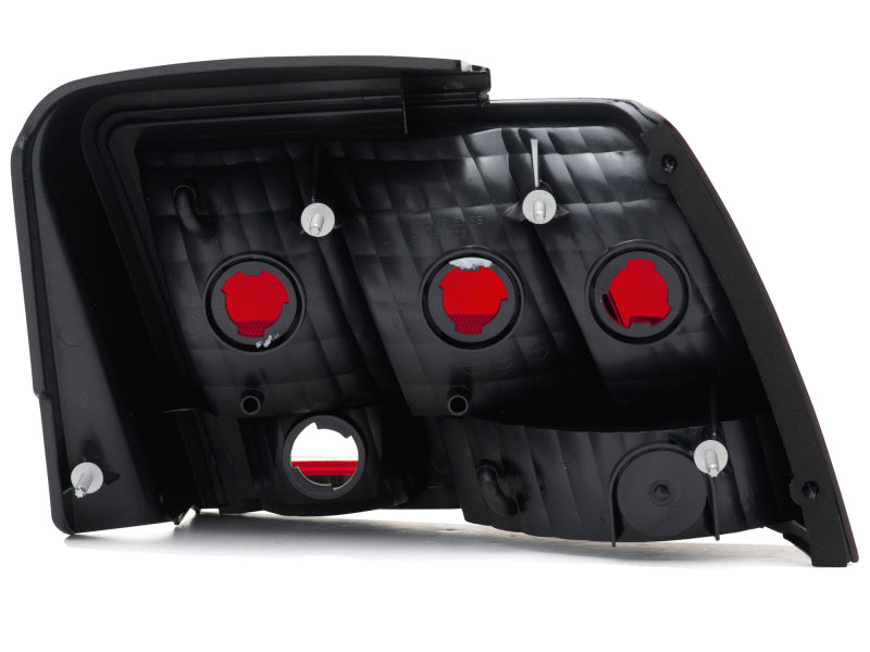 Raxiom 99-04 Ford Mustang Excluding 99-01 Cobra Tail Lights- Black Housing (Smoked Lens) - Racecraft Industries