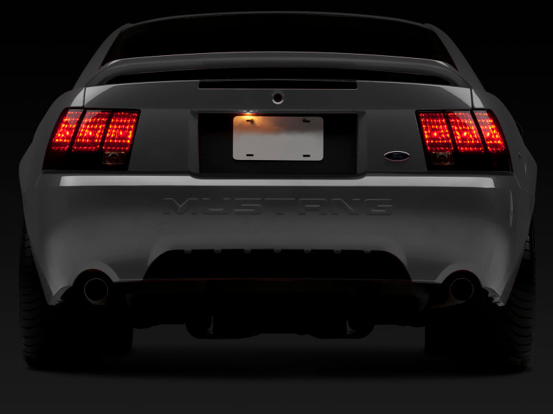 Raxiom 99-04 Ford Mustang Excluding 99-01 Cobra Tail Lights- Black Housing (Smoked Lens) - Racecraft Industries