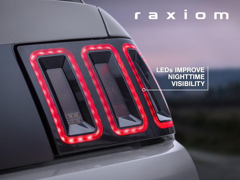 Raxiom 99-04 Ford Mustang Excluding 99-01 Cobra Icon LED Tail Lights- Black Housing (Smoked Lens) - Racecraft Industries