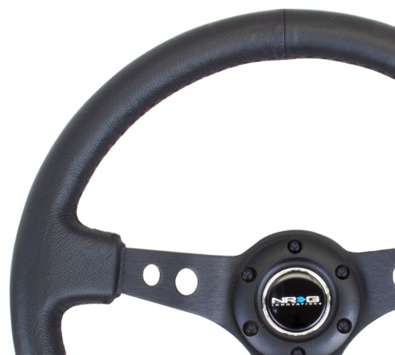 NRG Reinforced Steering Wheel (350mm / 3in. Deep) Blk Leather w/Blk Spoke & Circle Cutouts - Racecraft Industries