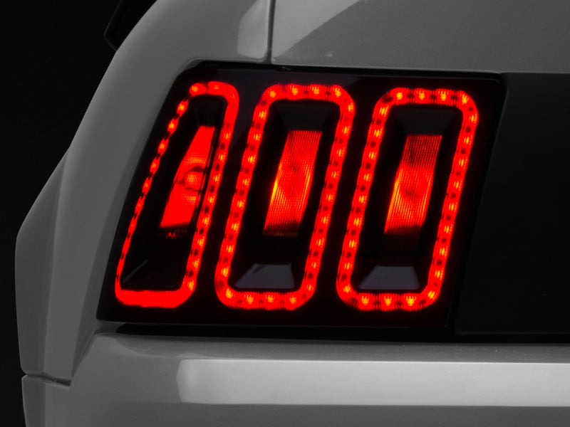 Raxiom 99-04 Ford Mustang Excluding 99-01 Cobra Icon LED Tail Lights- Black Housing (Smoked Lens) - Racecraft Industries