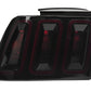 Raxiom 99-04 Ford Mustang Excluding 99-01 Cobra Icon LED Tail Lights- Black Housing (Smoked Lens) - Racecraft Industries